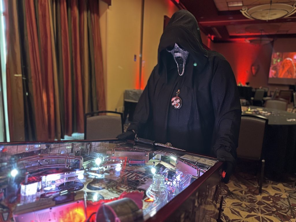 Ghostface plays pinball at Mad monster Expo
