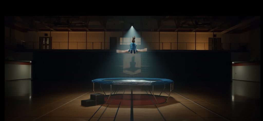 The cheerleader sequence was revised from original to movie