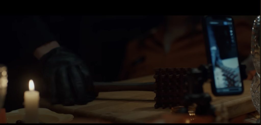 Carver uses a meat tenderizer on one of his victims